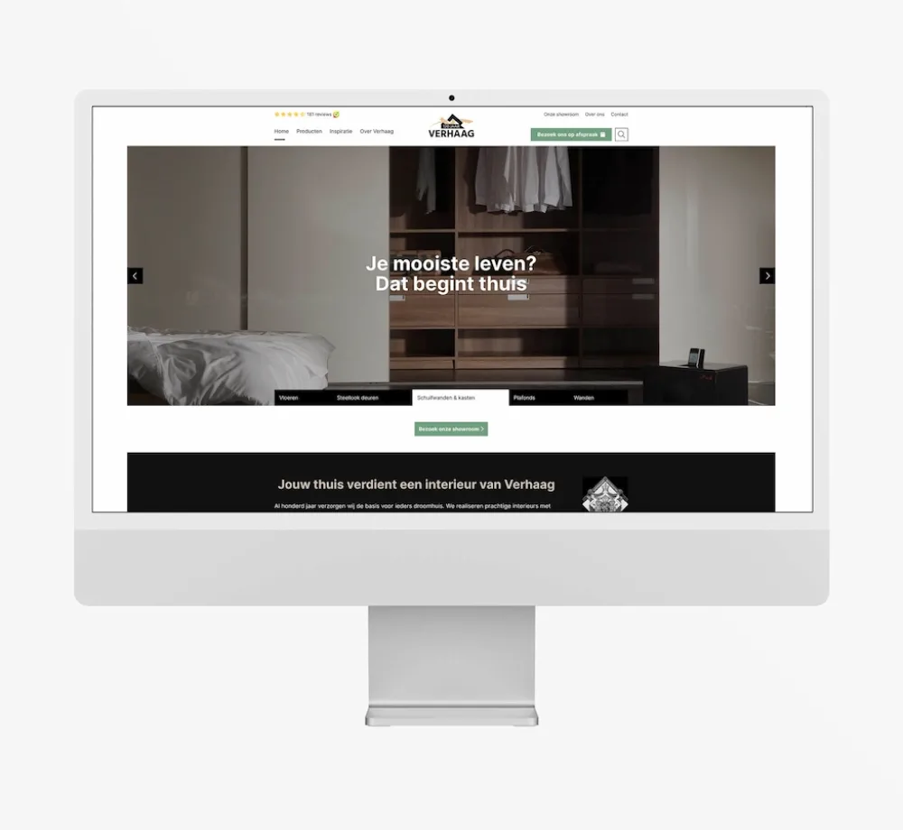 Website van Verhaag met interieurbeeld op desktop